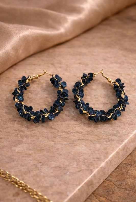 Argolas de pétalas azuis